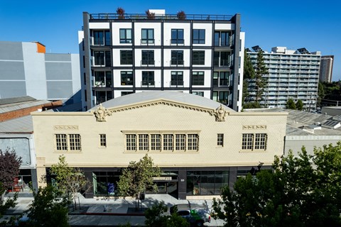 an old building in front of a tall building