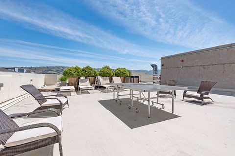 Rooftop seating area and ping pong table
