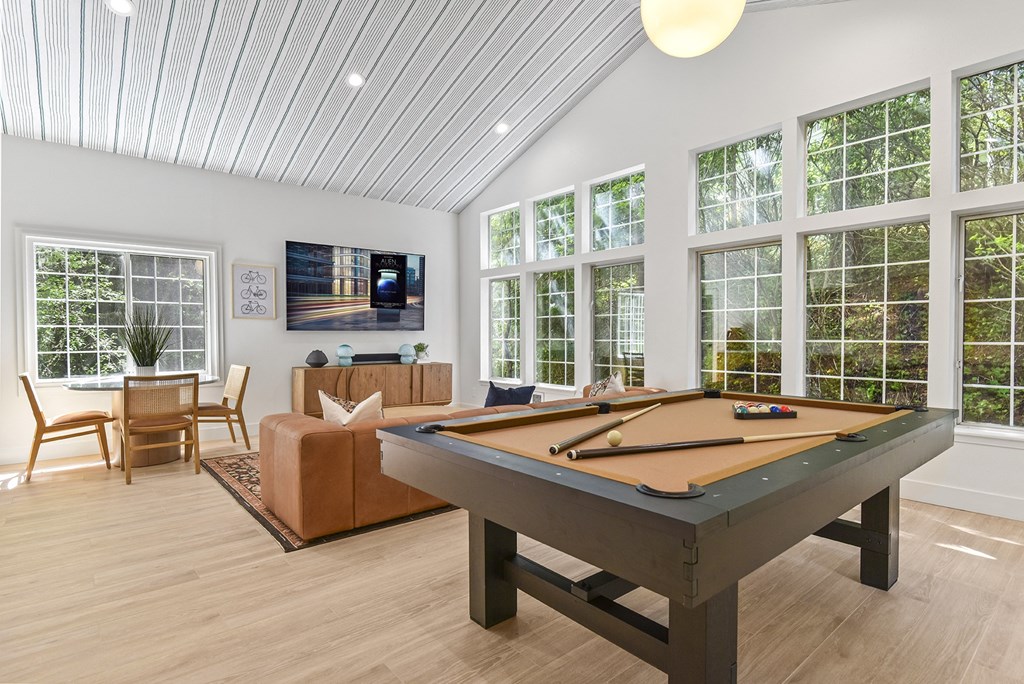 a pool table in the clubroom with windows at Lakemont Orchard, Issaquah