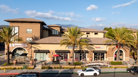 A building with a sign that says "Morgan Secrets" in front of it.