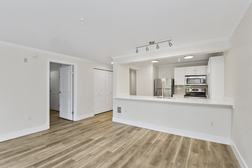 a kitchen and living room