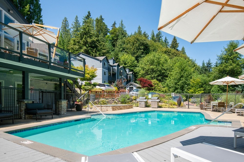 a swimming pool in the backyard of a house with a pool at Lakemont Orchard, Issaquah, 98027