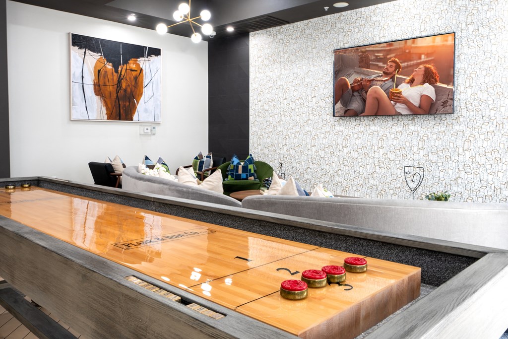 a ping pong table in the lobby of a hotel