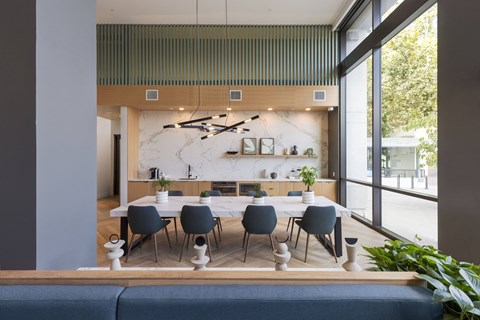 loft house clubroom with large dining space and window