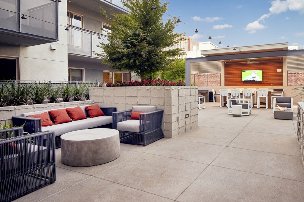 Outdoor lounge with TV at Main+Nine, Riverside, 92501