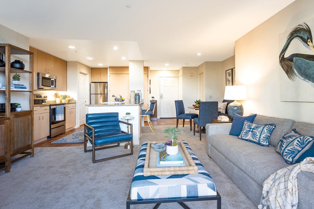a living room with a couch and a table