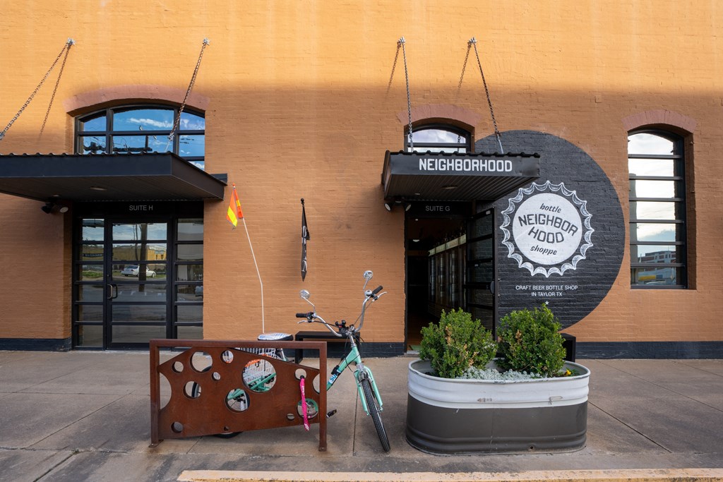 the outside of a restaurant with a bike parked in front of it at Mihir Taylor, Taylor, Texas