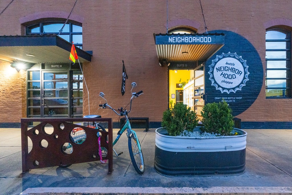 a bicycle parked in front of a building at Mihir Taylor, Taylor