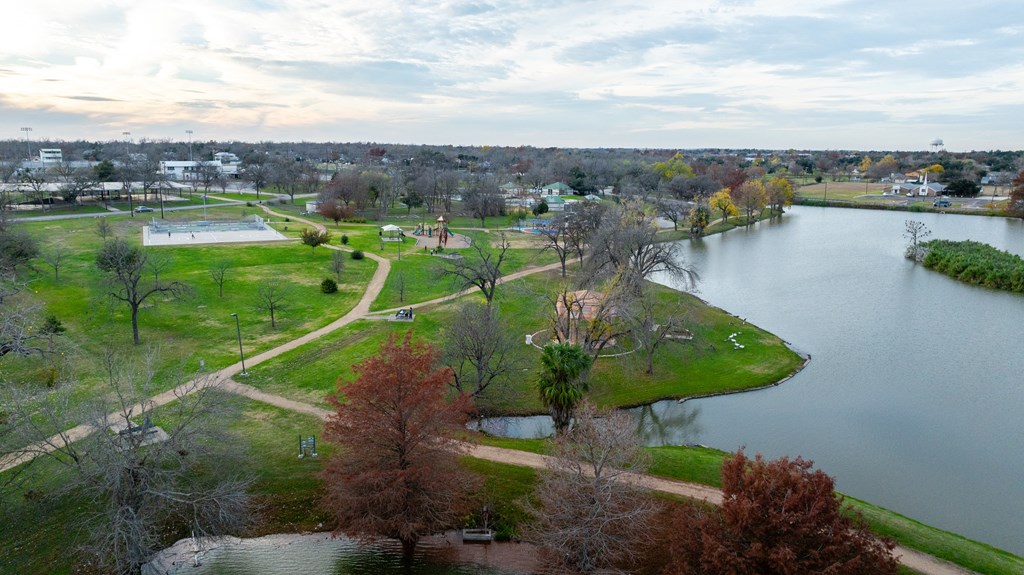 an aerial view of a park next to a lake at Mihir Taylor, Taylor, Texas