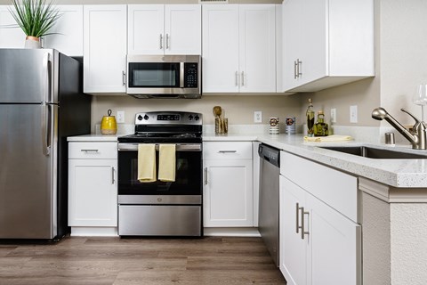 furnished kitchen with stainless steel appliances furnished kitchen with stainless steel appliances at Missions at Chino Hills, Chino Hills