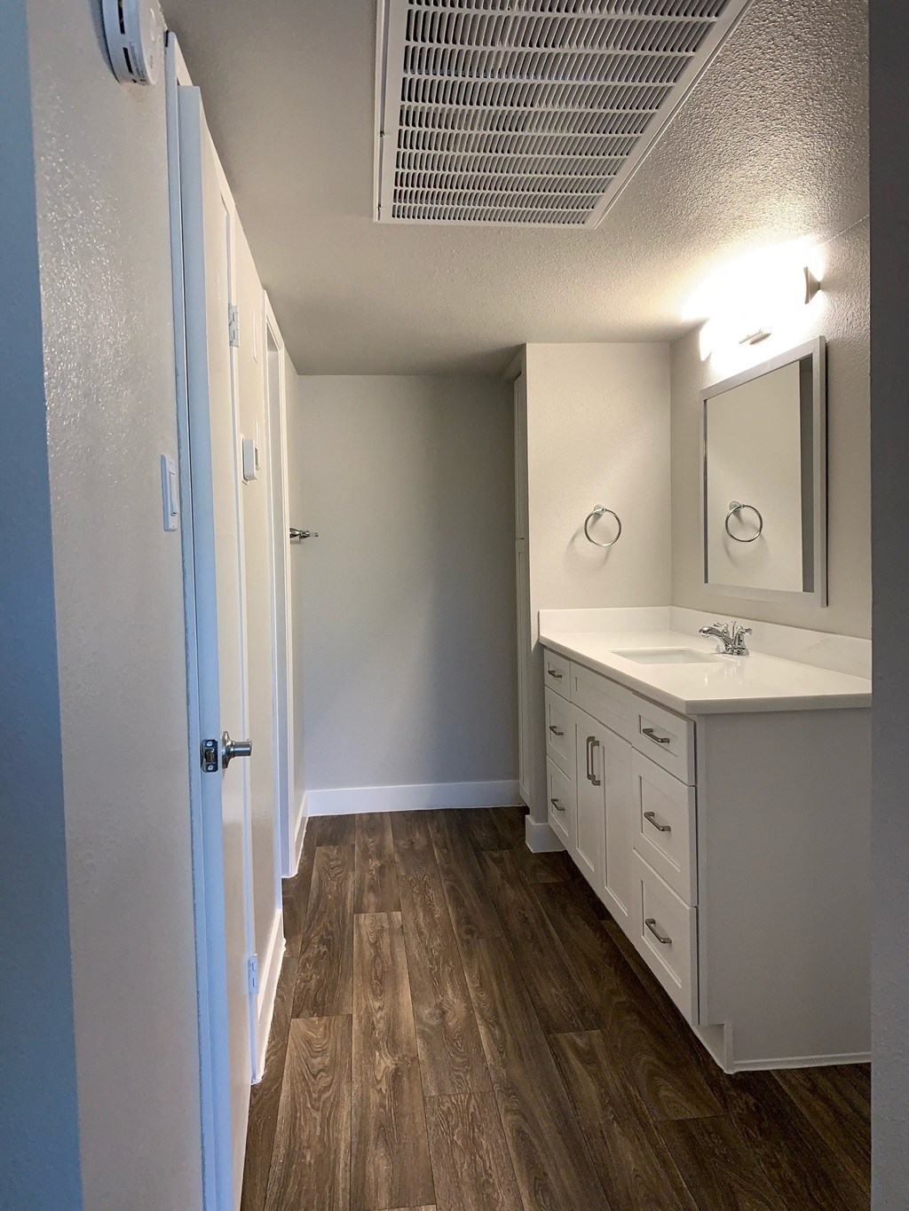 an empty bathroom with a sink and a mirror at Monaco at McCormick Ranch, Arizona