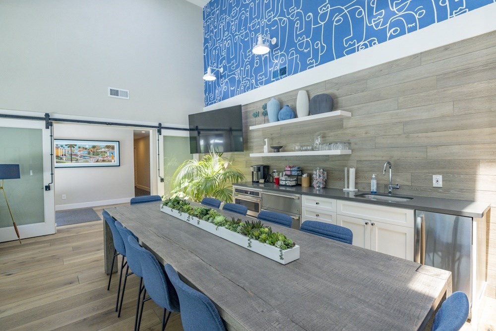 Clubroom with a table and chairs.