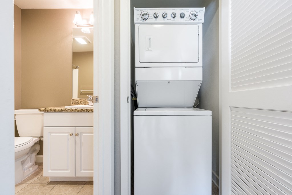 a laundry room with a washer and dryer