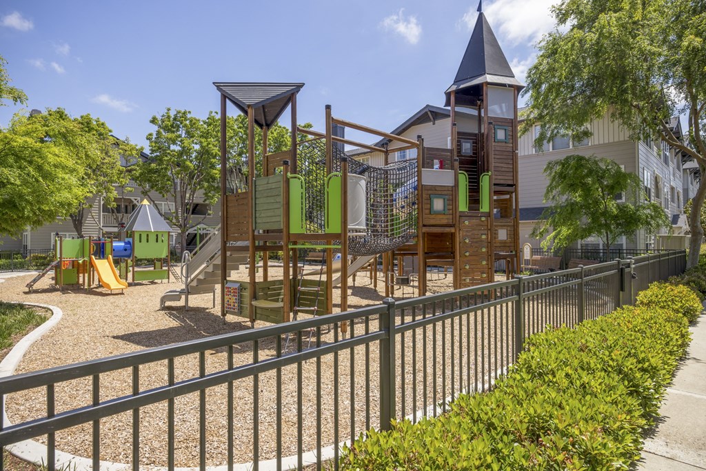 a playground at the whispering winds apartments in pearland, tx