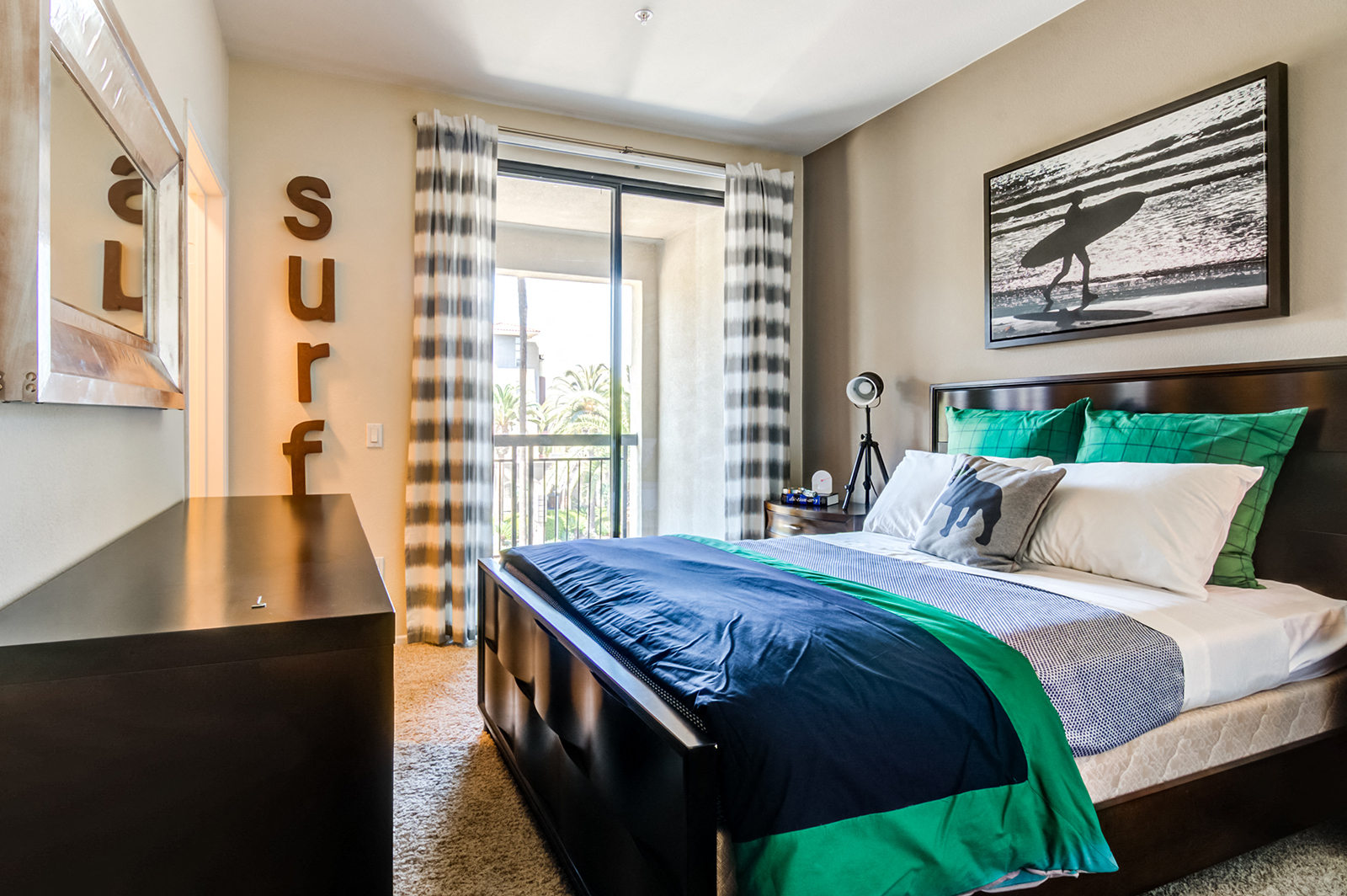 Bedroom with sliding glass doors to balcony