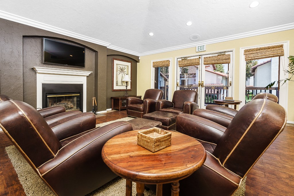 Clubroom with lounge seating and tv at Ridgecrest, Lake Forest, 92630
