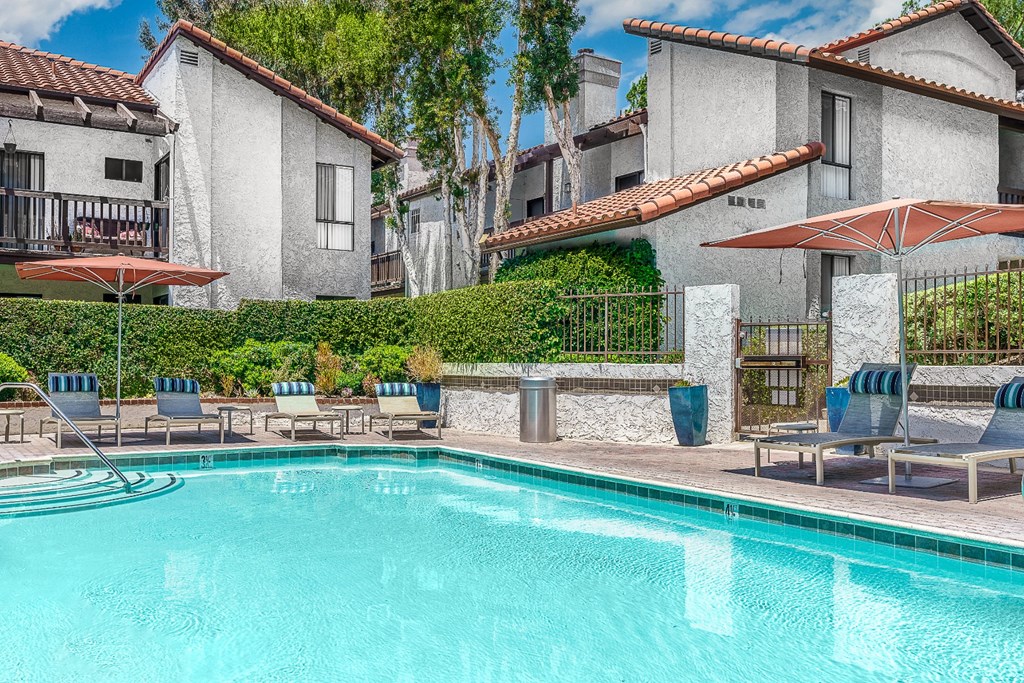 Pool with lounge seating at Ridgecrest, Lake Forest, 92630