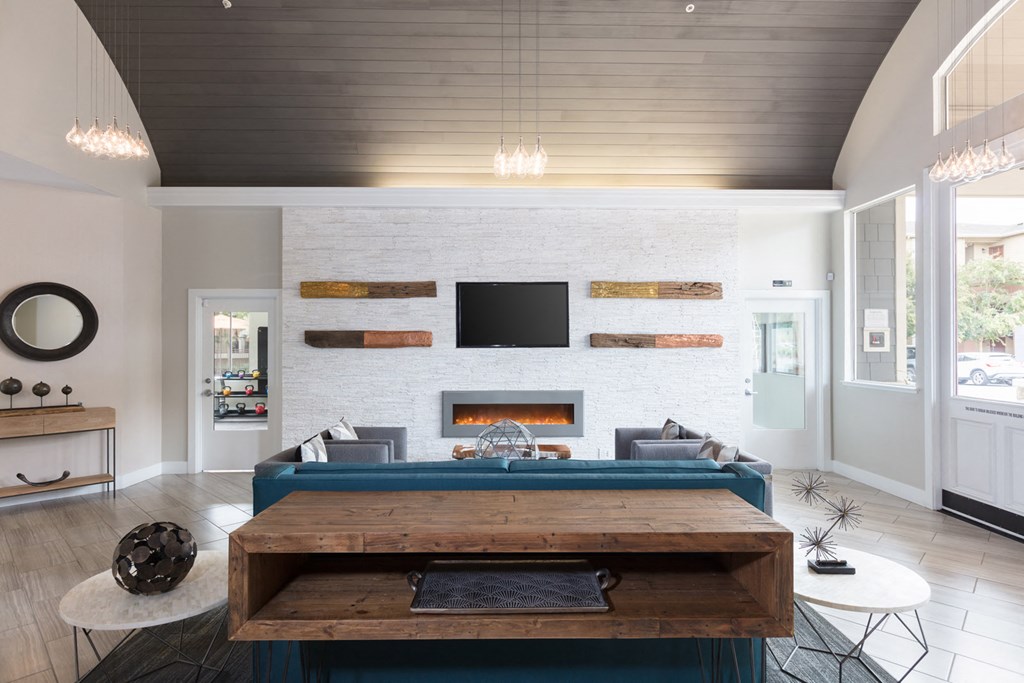 Clubroom with fireplace and TV