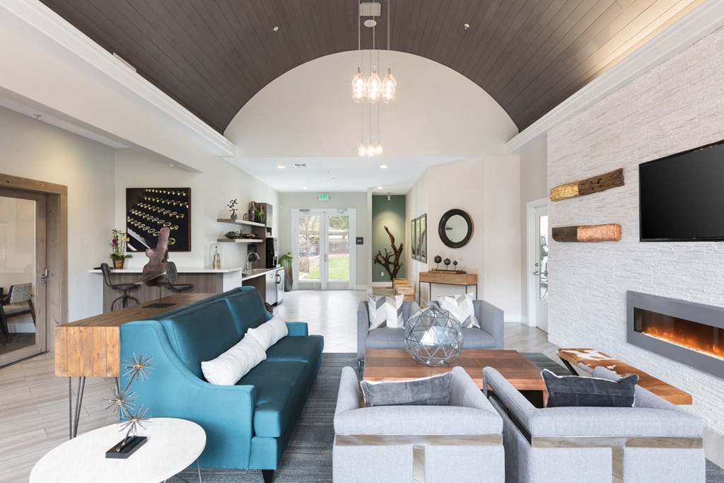 Clubroom with fireplace and TV