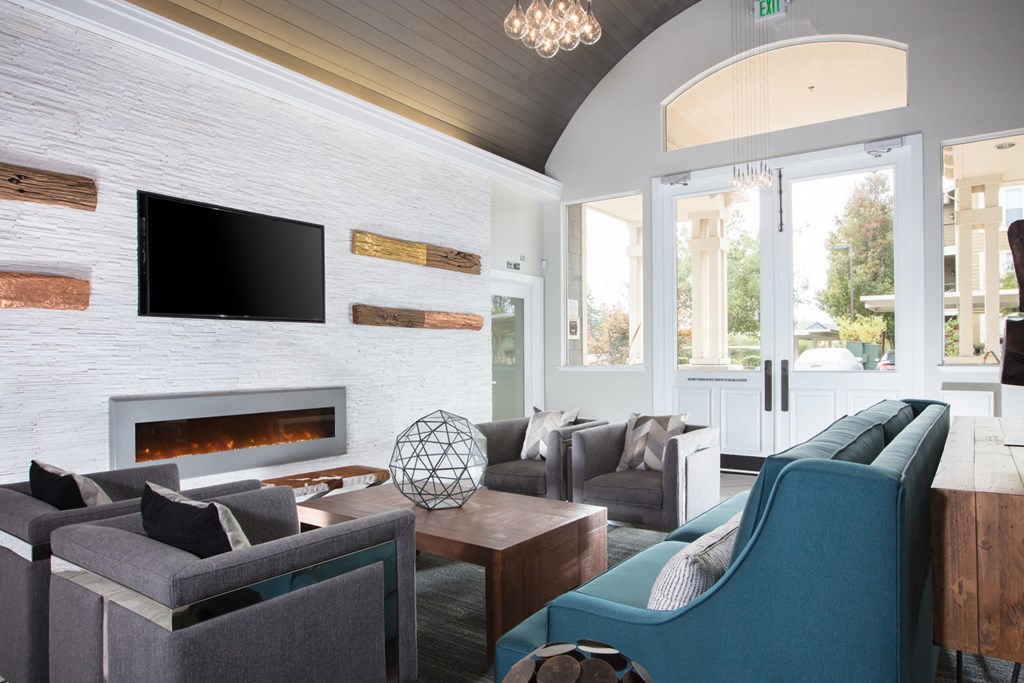 Clubroom with fireplace and TV