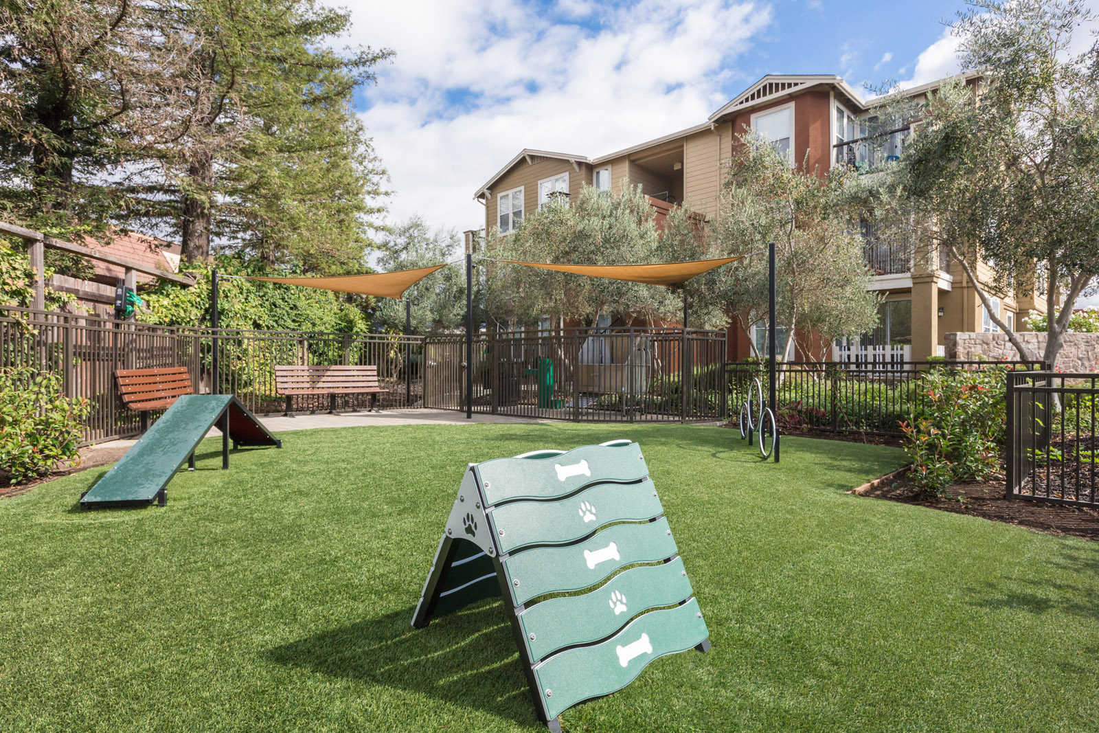 Dog park with bench and pet course