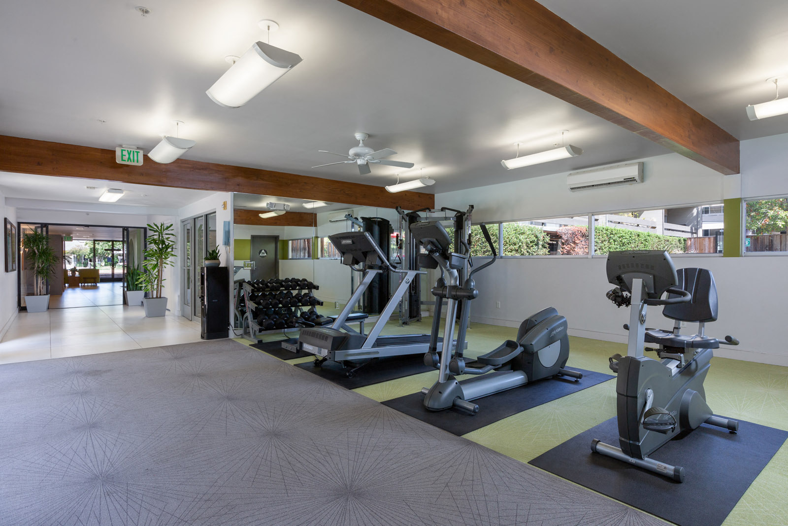 Apartments Palo Alto CA - Expansive Fitness Center Featuring Various Gym Equipment