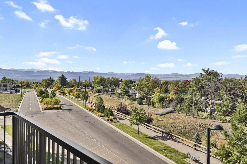 the view from the balcony overlooking the street and mountains at Parkside at Littleton Village, Littleton, Colorado