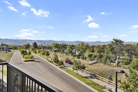 the view from the balcony overlooking the street and mountains at Parkside at Littleton Village, Littleton, Colorado