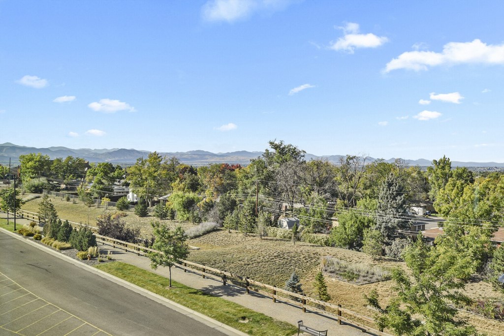 a view of a field with trees and a road at Parkside at Littleton Village, Colorado, 80122