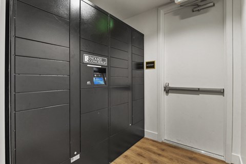 a black elevator with a door and a white door at Parkside at Littleton Village, Colorado