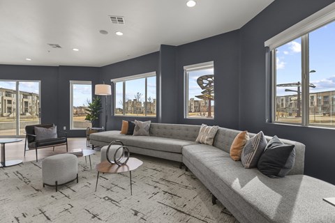 a living room with gray walls and a gray couch at Parkside at Littleton Village, Colorado