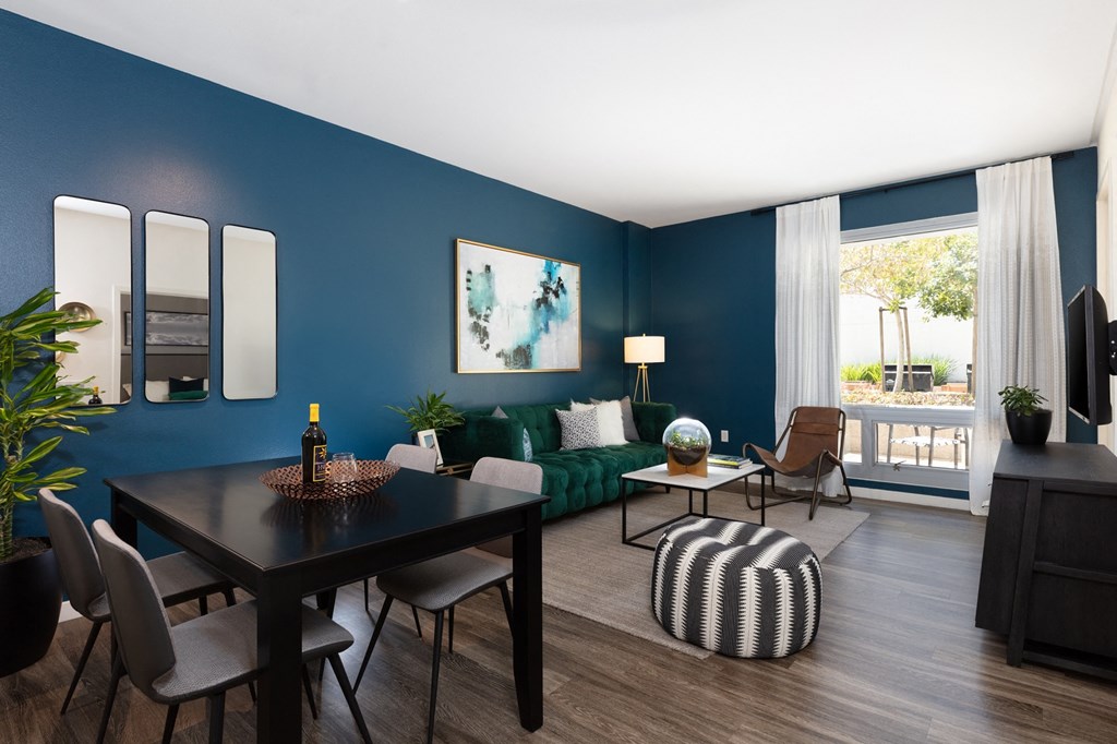 Luxury Dog-Friendly Apartments in San Fransisco, CA - Strata at Mission Bay - Spacious Living Room with Wood-Style Flooring and Floor-to-Ceiling Windows