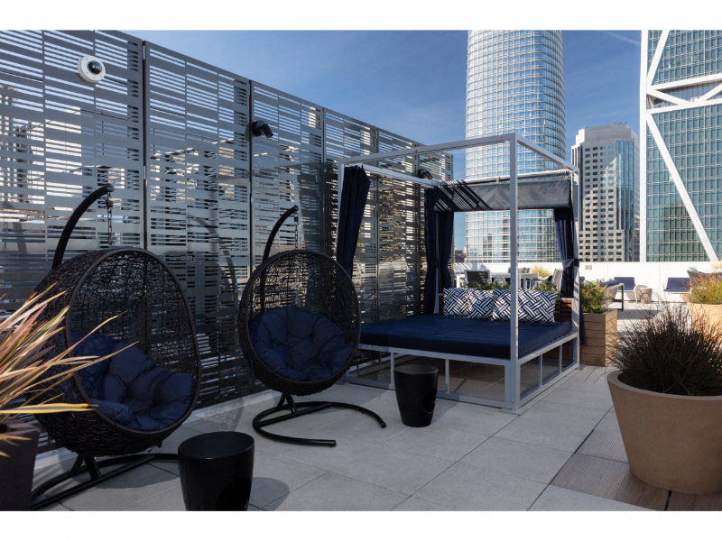 rooftop lounge with day bed and lounge seating
