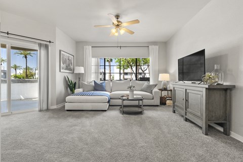 a living room with a couch and a tv