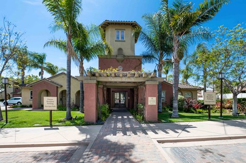 The image shows a building with a sign that reads "Van Ness Ranch" in front of it.
