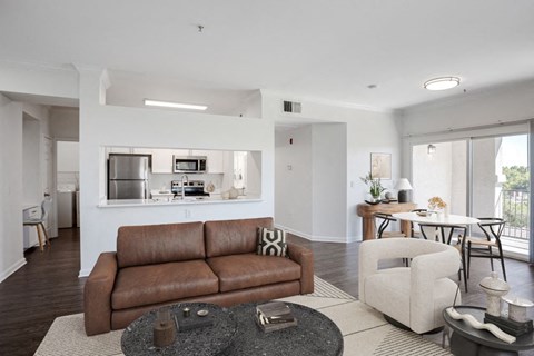 a living room with a couch and a table