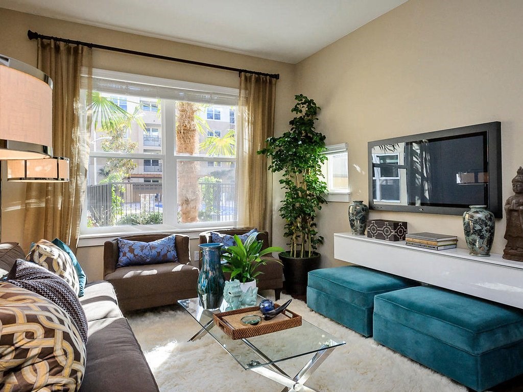 a living room with a couch and a television