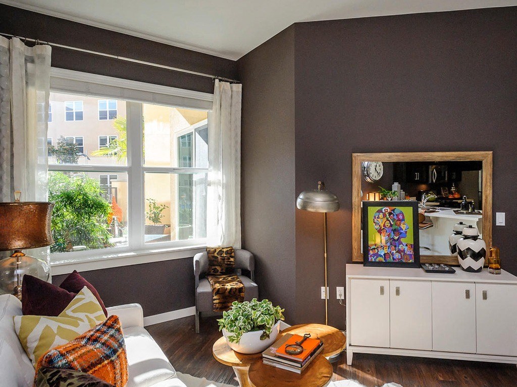 a living room with a couch and a table