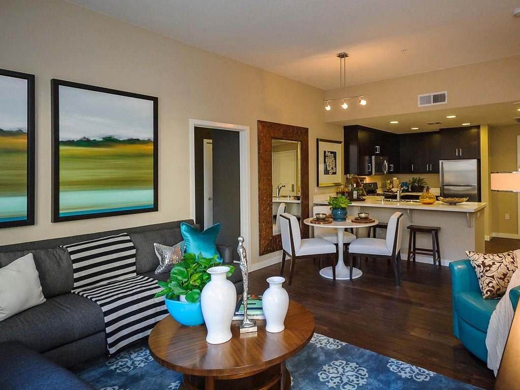 a living room with a couch and a table