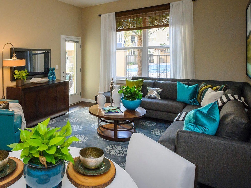 a living room with a couch and a table