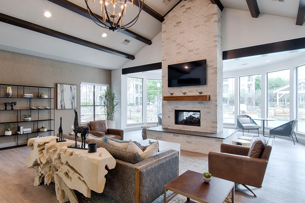 seating area with couches and fireplace