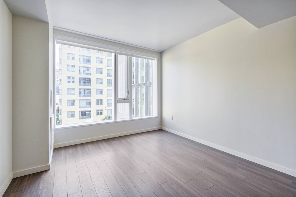 unfurnished floor plan with wood plank style flooring