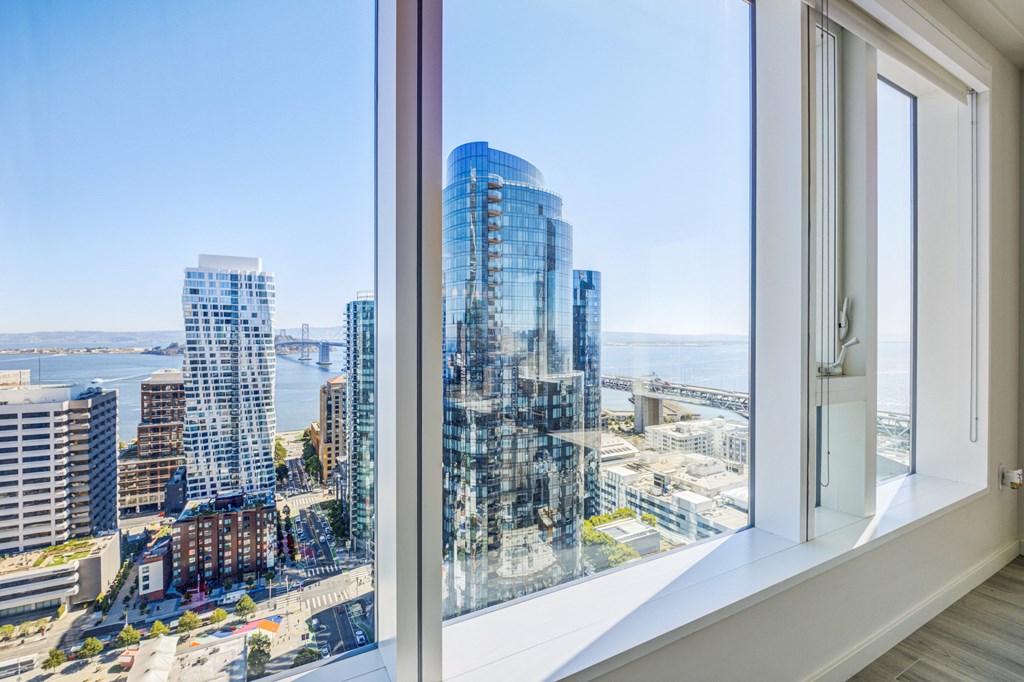 wide open window with city skyline views