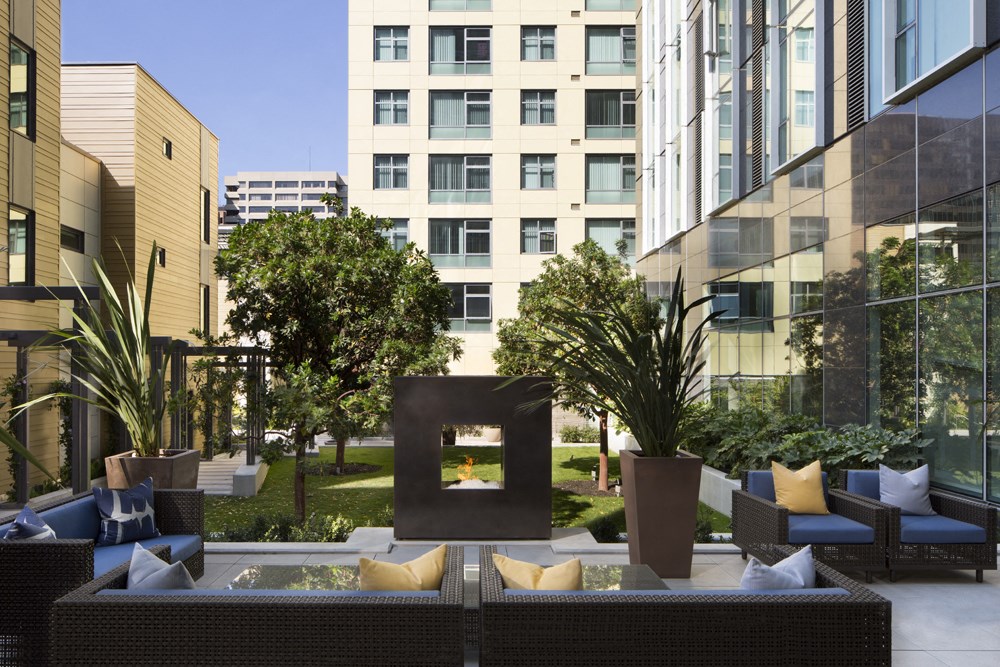 Ground floor outdoor courtyard w/ fireplace & putting green