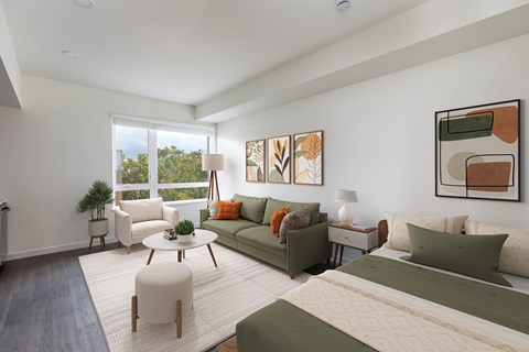 Living room staged photo with couch and paintings