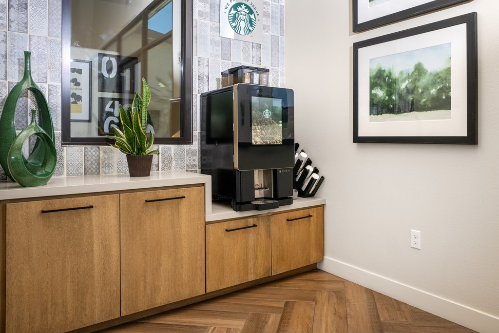 A Starbucks sign is on the window of a building.