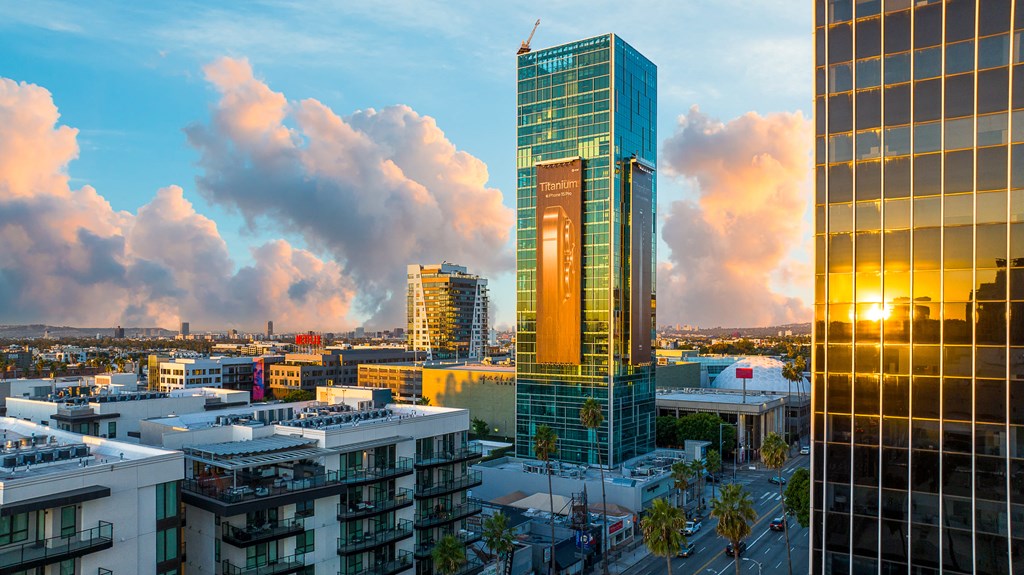 a sunset view of the city with Sunset Vine Towers in the background