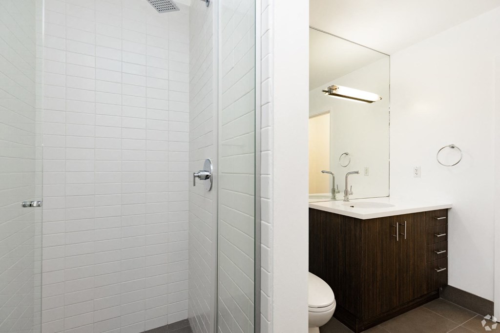 a bathroom with a toilet and a sink