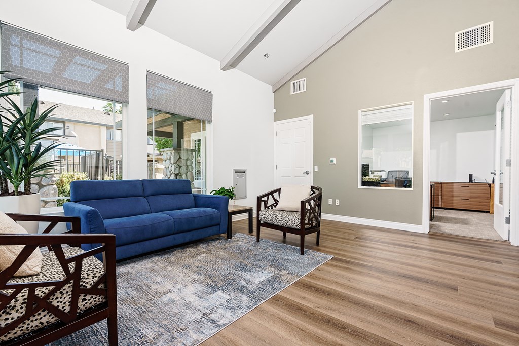 Leasing office with blue couch at Sunstone Place, Riverside, California