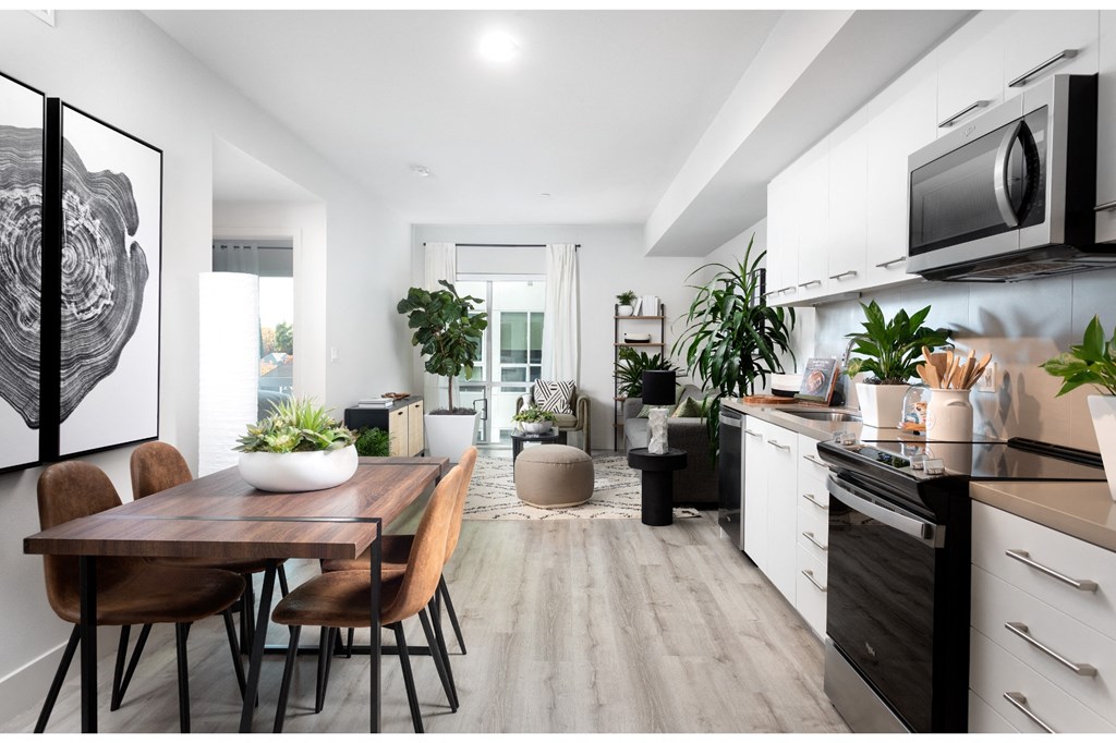 model furnished floor plan with kitchen and living room